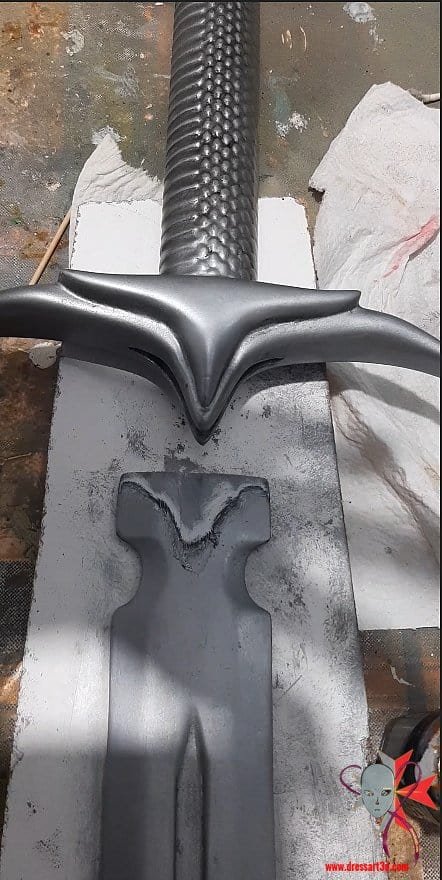 paint stripped form the blade and the cross guard where both will be joined